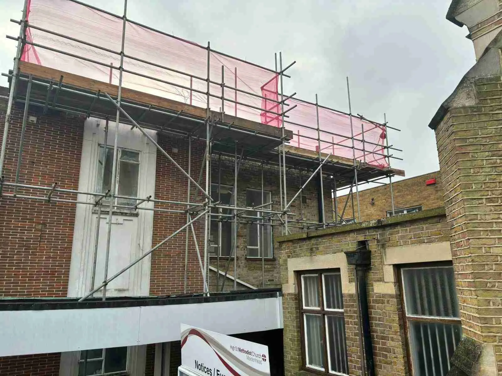 Commercial scaffolding erected by ATC Scaffolding on a shop and office building