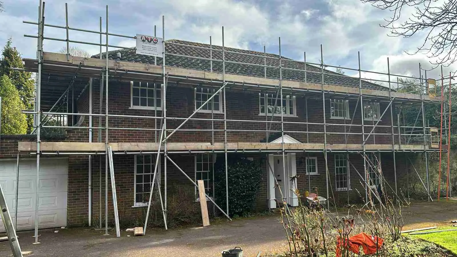 Domestic scaffolding erected by ATC Scaffolding around a house for roofing and exterior works