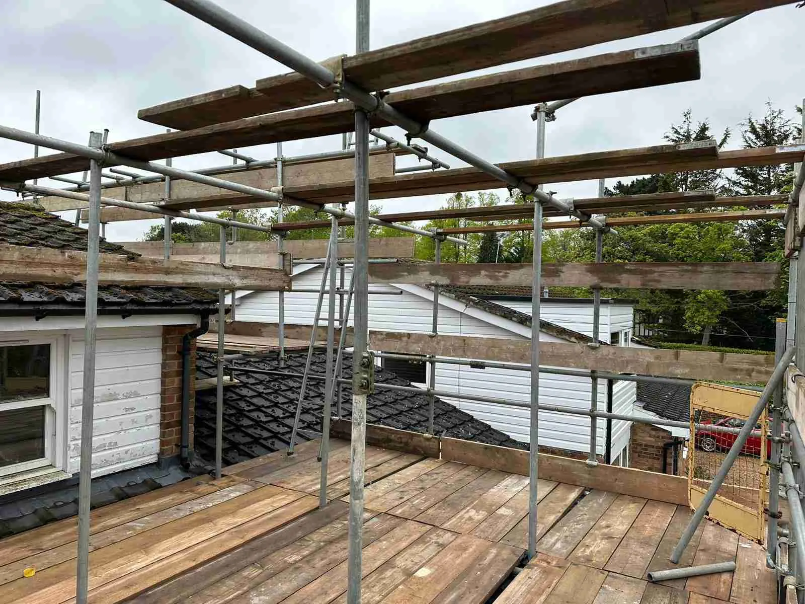 Domestic scaffolding erected by ATC Scaffolding around a house for roofing and exterior works