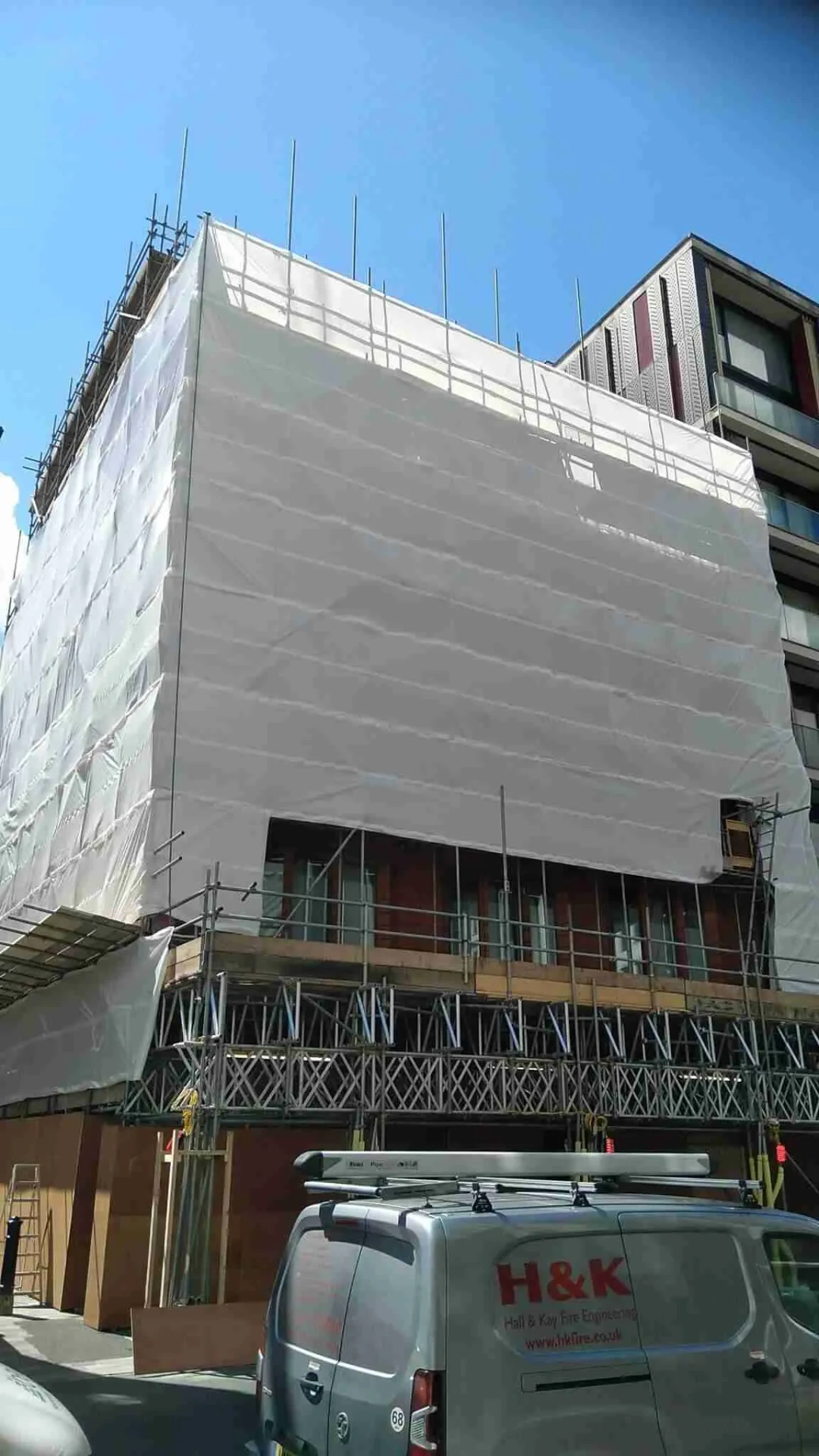 Commercial scaffolding erected by ATC Scaffolding on a shop and office building
