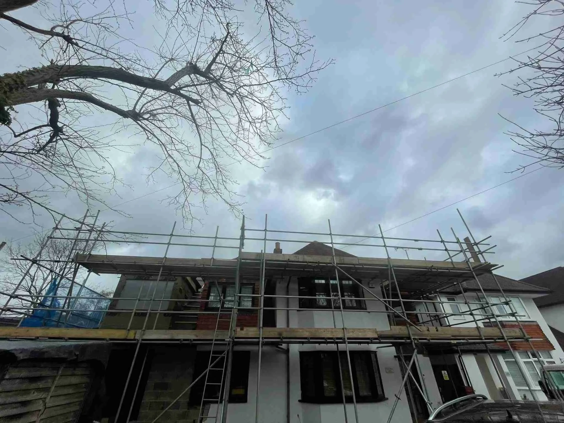 Domestic scaffolding erected by ATC Scaffolding around a house for roofing and exterior works