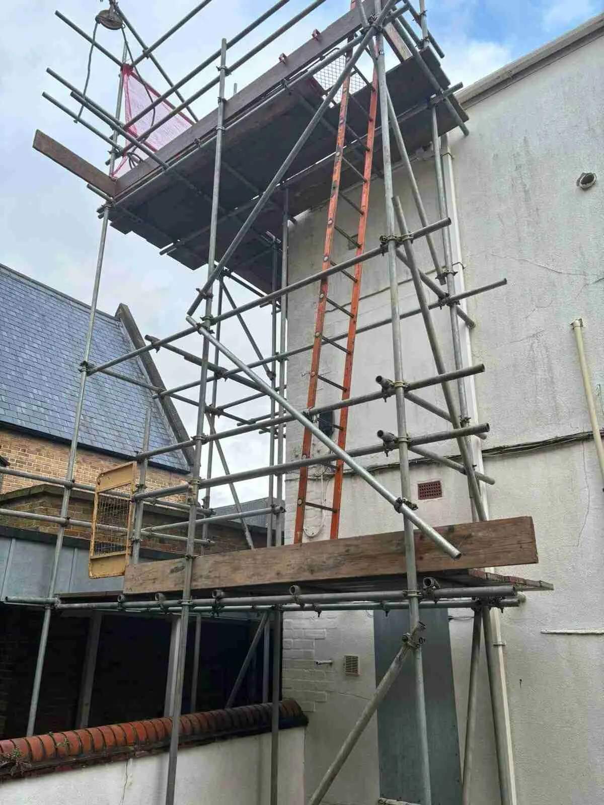 Commercial scaffolding erected by ATC Scaffolding on a shop and office building