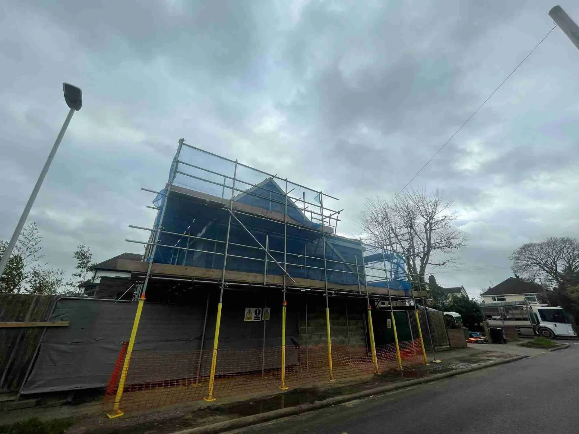 Domestic scaffolding erected by ATC Scaffolding around a house for roofing and exterior works