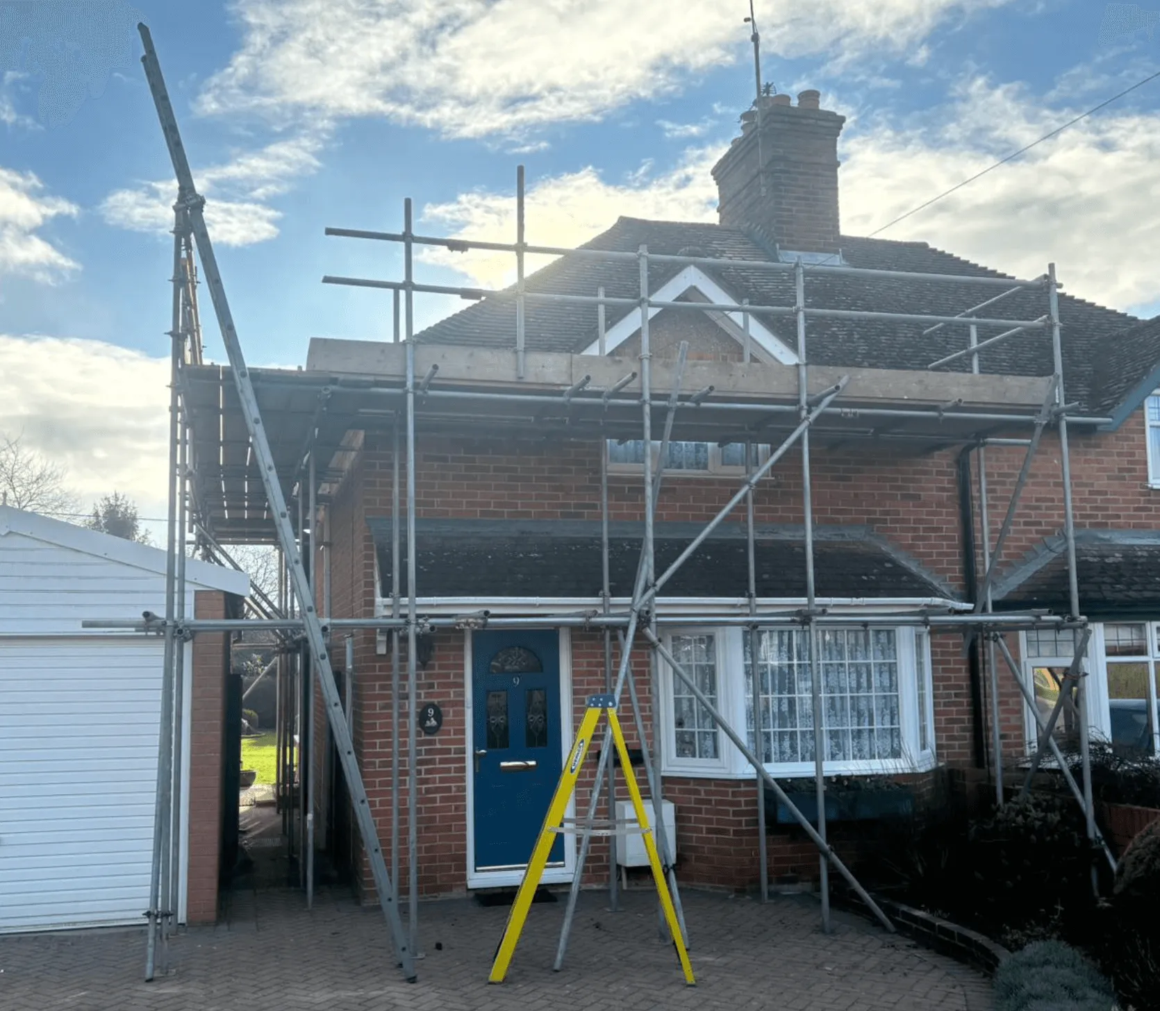 Domestic scaffolding erected by ATC Scaffolding around a house for roofing and exterior works