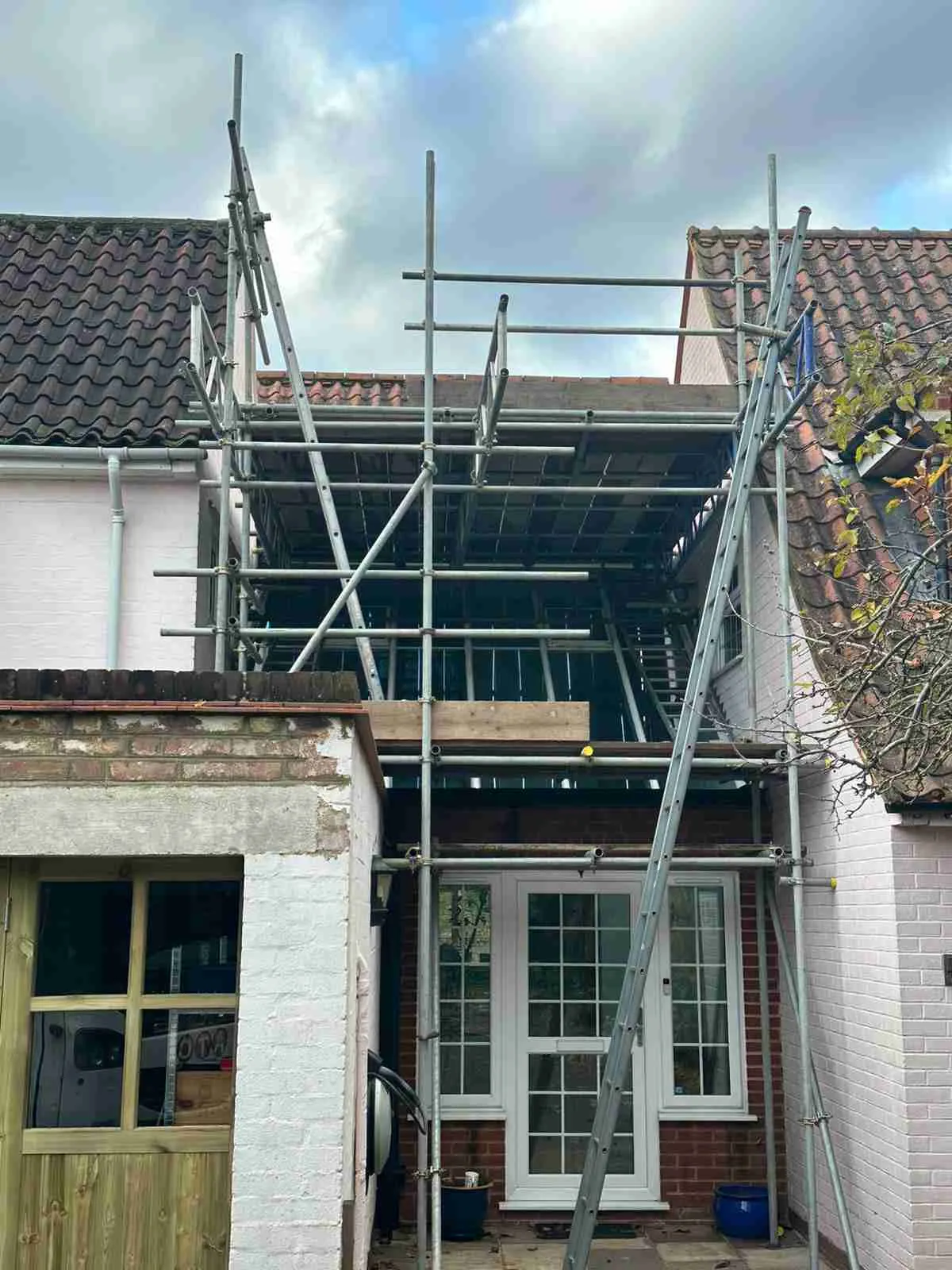 Domestic scaffolding erected by ATC Scaffolding around a house for roofing and exterior works